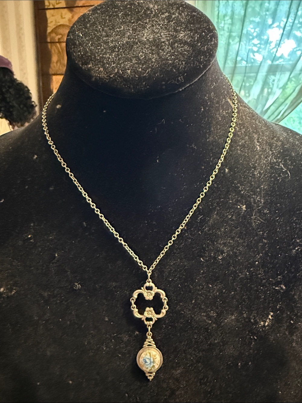 Vintage 1928 Brand Silvertone station drop necklace with blue flowers